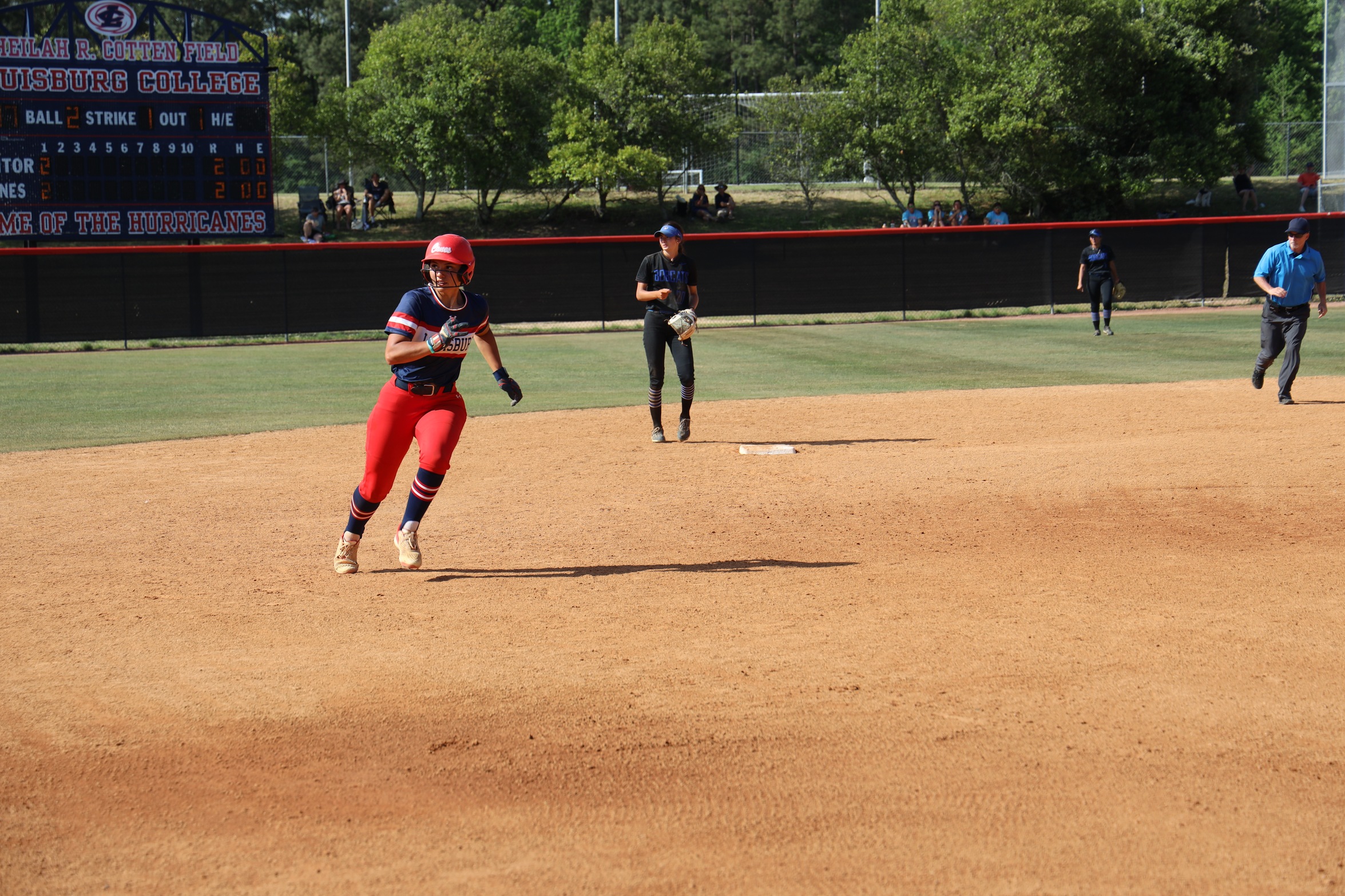 Hurricanes base runner heading to thrid base.
