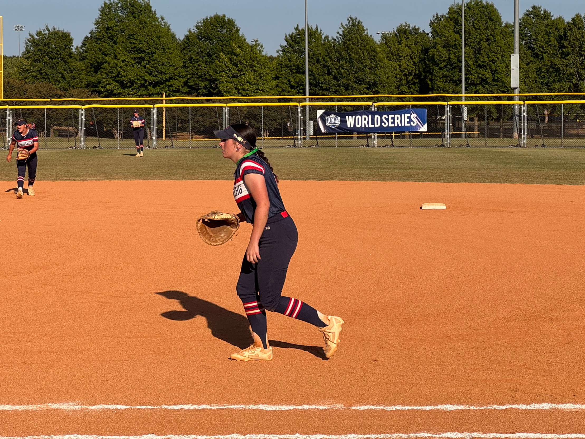 Allie Boone at first base, ready to field